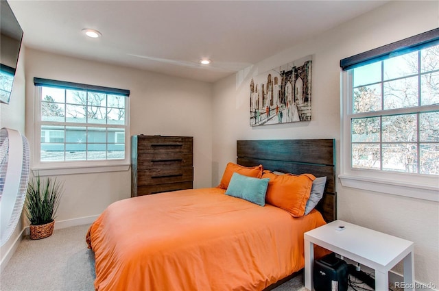 carpeted bedroom with recessed lighting and baseboards