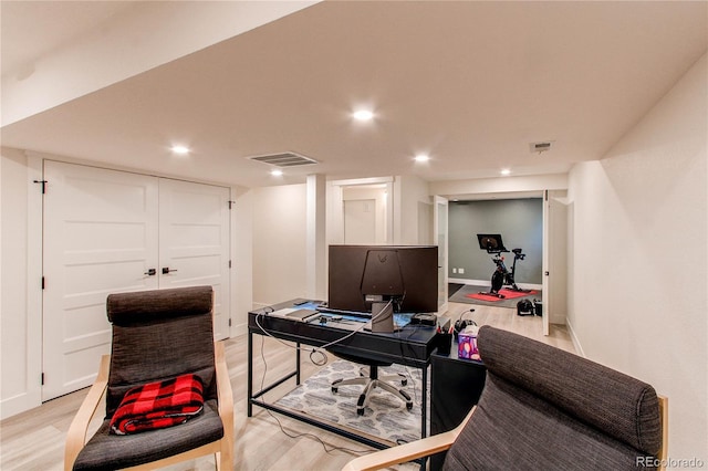 office area with recessed lighting, visible vents, baseboards, and light wood-style floors