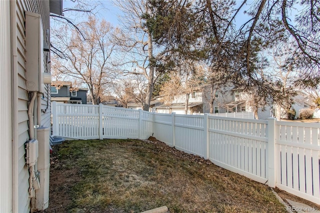 view of yard with a fenced backyard