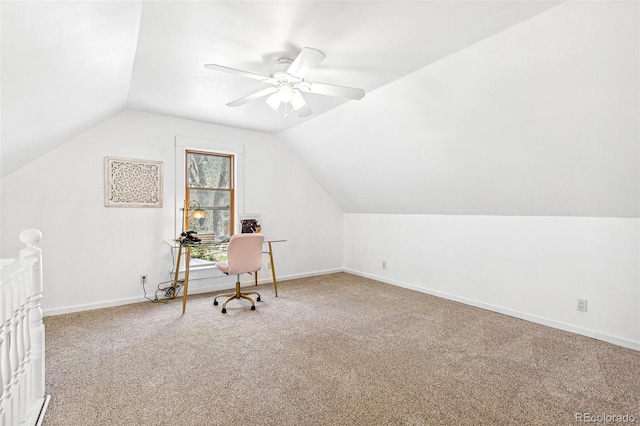 home office with baseboards, carpet, ceiling fan, and lofted ceiling
