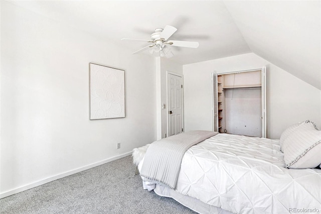 carpeted bedroom featuring ceiling fan and vaulted ceiling