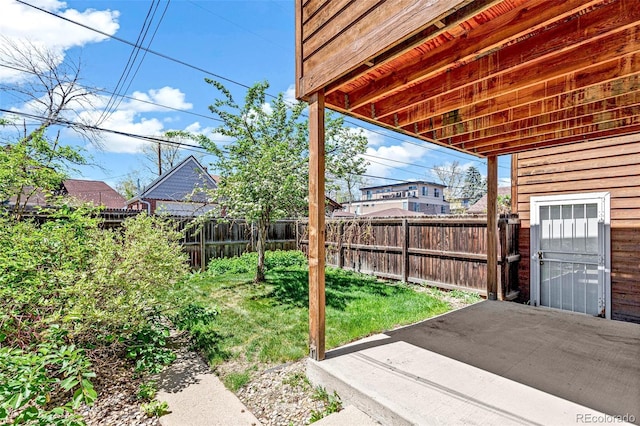 view of yard featuring a fenced backyard and a patio area