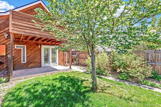 exterior space featuring a fenced backyard and a patio area