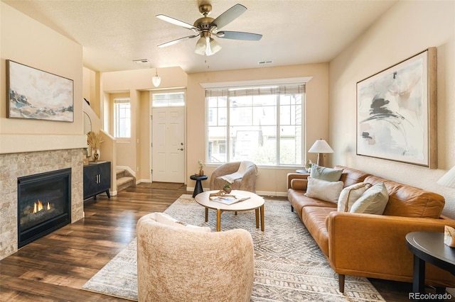 5562 W 72nd Pl, Westminster, CO 80003 - living room featuring wood finished floors, ceiling fan, and a fireplace