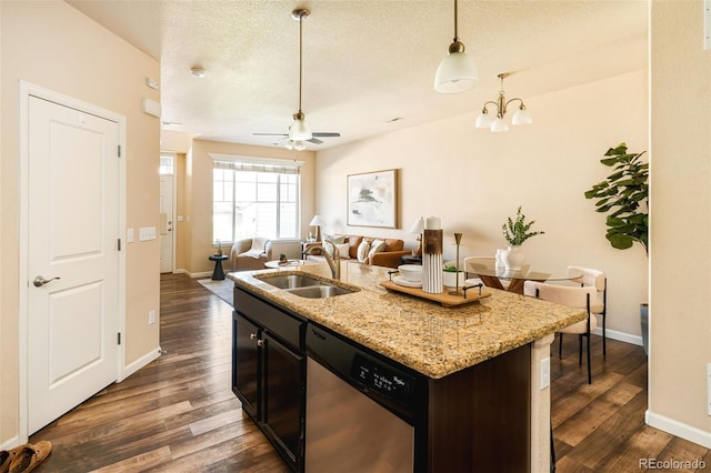 5562 W 72nd Pl, Westminster, CO 80003 - kitchen featuring dishwasher, open floor plan, dark wood-type flooring, light stone counters, and a ceiling fan