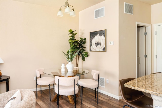5562 W 72nd Pl, Westminster, CO 80003 - dining space with wood finished floors and a chandelier