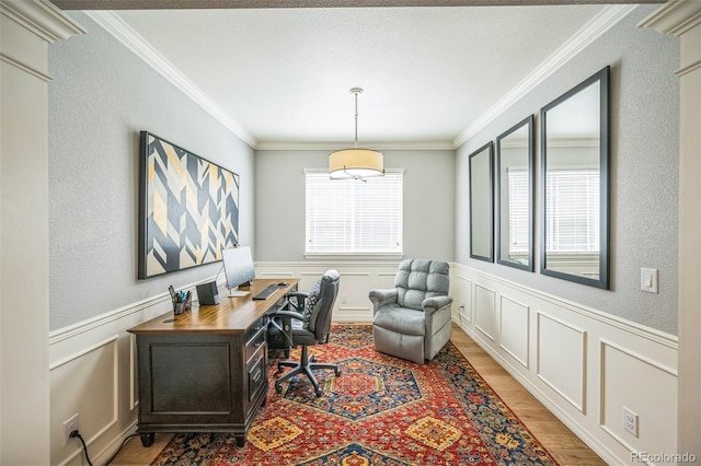 1261 W 170th Ave, Broomfield, CO 80023 - home office with ornamental molding, healthy amount of natural light, light wood-type flooring, wainscoting, and a decorative wall