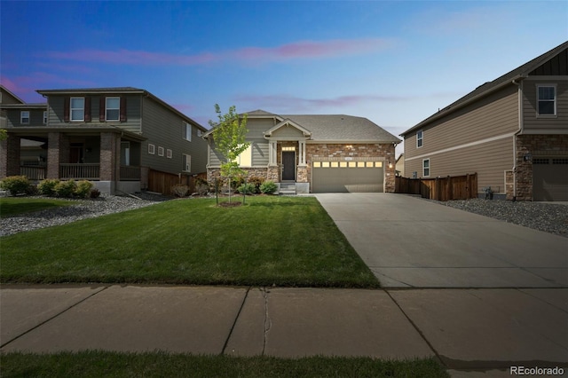 1261 W 170th Ave, Broomfield, CO 80023 - view of front of house featuring driveway, an attached garage, and stone siding