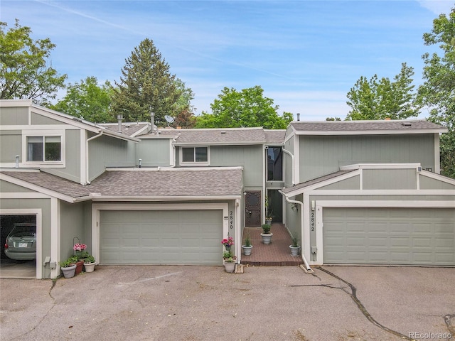 2840 S Kenton Ct, Aurora, CO 80014 - view of front of home featuring roof with shingles and a garage