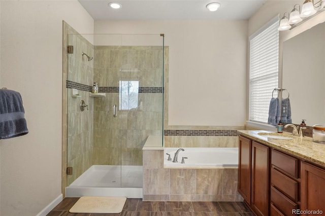 15960 W 62nd Dr, Arvada, CO 80403 - full bathroom featuring a shower stall, a garden tub, and vanity