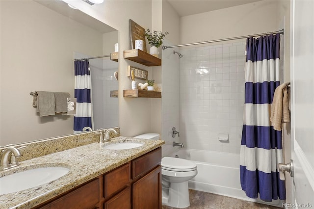 15960 W 62nd Dr, Arvada, CO 80403 - full bath featuring a sink, double vanity, shower / tub combo with curtain, and toilet