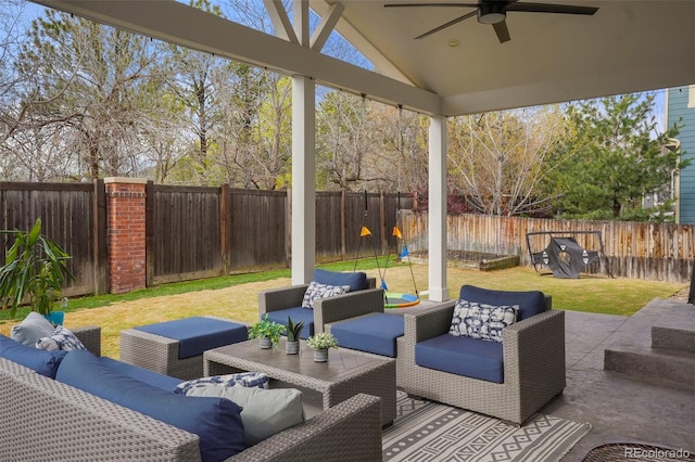 15960 W 62nd Dr, Arvada, CO 80403 - view of patio with an outdoor hangout area, a fenced backyard, and a ceiling fan