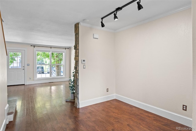 10814 Bayfield Way, Parker, CO 80138 - unfurnished room featuring rail lighting, wood finished floors, and crown molding