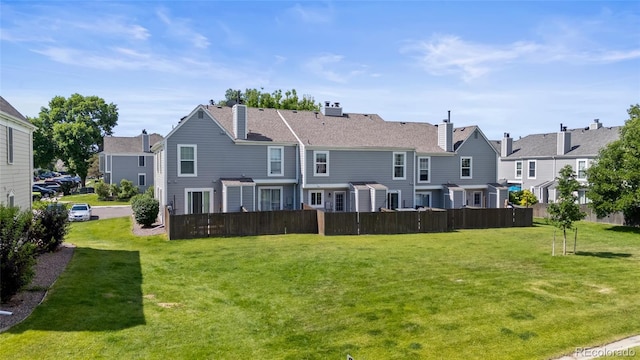 10814 Bayfield Way, Parker, CO 80138 - back of house featuring a residential view and a chimney
