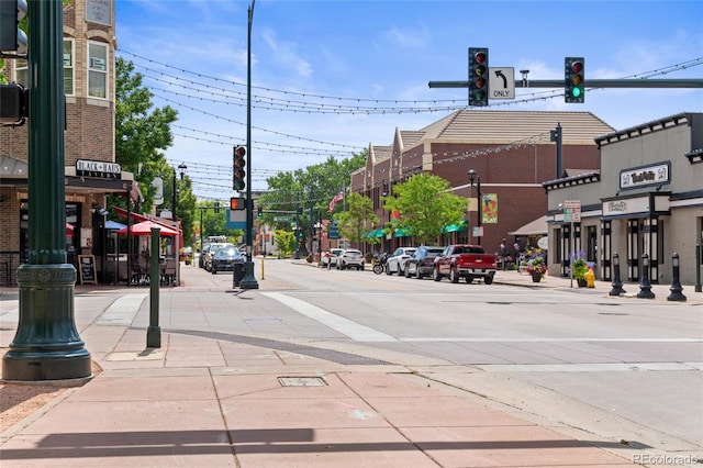 10814 Bayfield Way, Parker, CO 80138 - view of asphalt street with traffic lights, sidewalks, street lighting, and curbs
