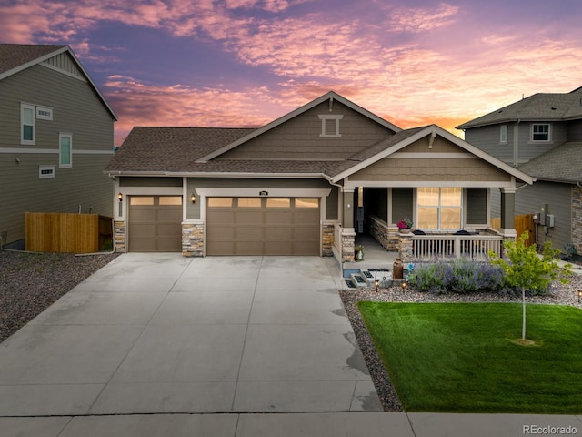 craftsman-style home featuring a yard and a porch