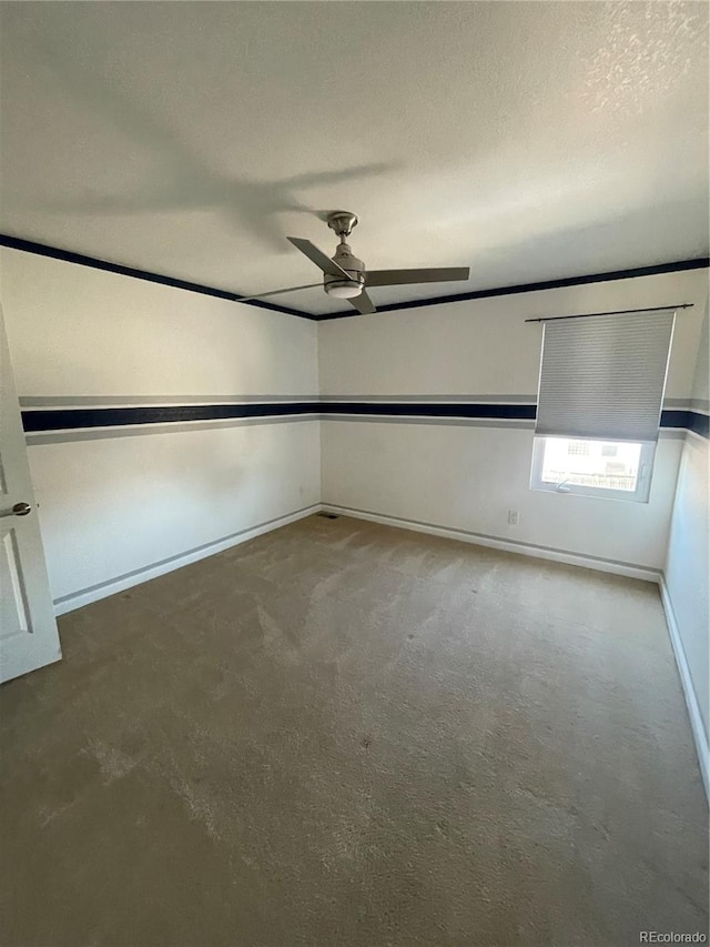 unfurnished bedroom featuring ceiling fan and a textured ceiling