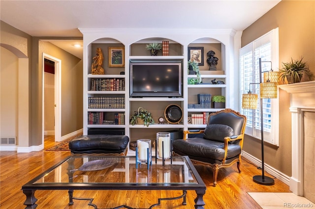 9 Roder Gate Ln, Castle Pines, CO 80108 - sitting room featuring wood finished floors and baseboards