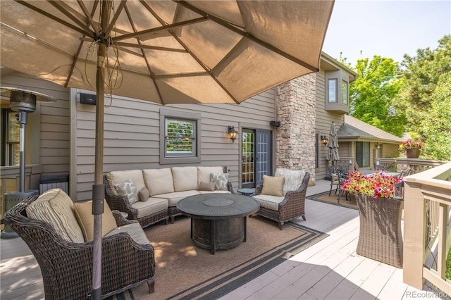 9 Roder Gate Ln, Castle Pines, CO 80108 - deck featuring an outdoor hangout area