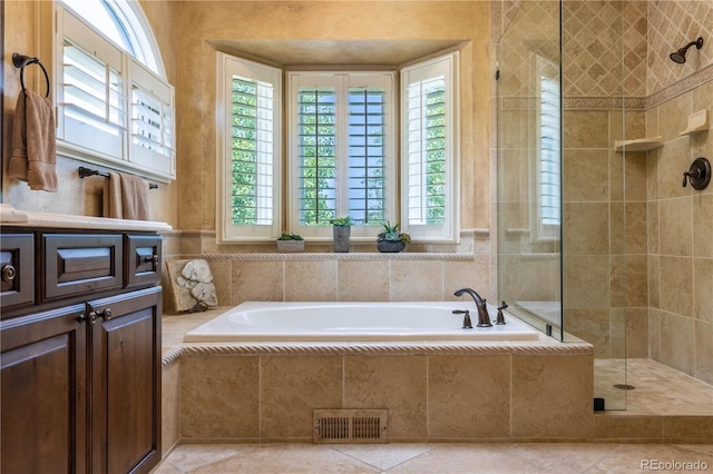 9 Roder Gate Ln, Castle Pines, CO 80108 - bathroom with a garden tub and a tile shower