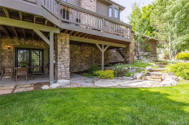 9 Roder Gate Ln, Castle Pines, CO 80108 - view of green lawn with a deck