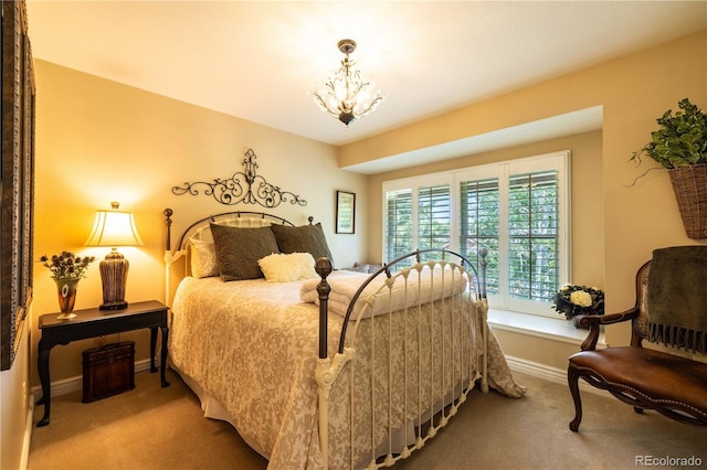 9 Roder Gate Ln, Castle Pines, CO 80108 - carpeted bedroom with a chandelier and baseboards