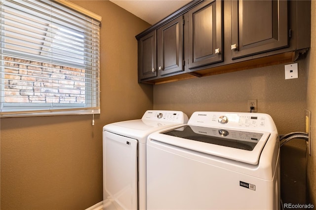 9 Roder Gate Ln, Castle Pines, CO 80108 - laundry room with washing machine and dryer, cabinet space, and a textured wall