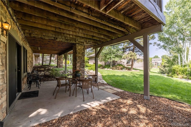 9 Roder Gate Ln, Castle Pines, CO 80108 - view of patio / terrace with outdoor dining area