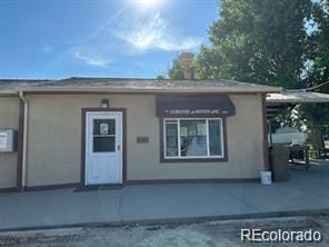 213 Kiowa Rd, Weldona, CO 80653 - view of front of home featuring stucco siding