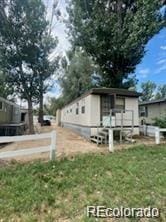 213 Kiowa Rd, Weldona, CO 80653 - view of front of home with an outdoor structure