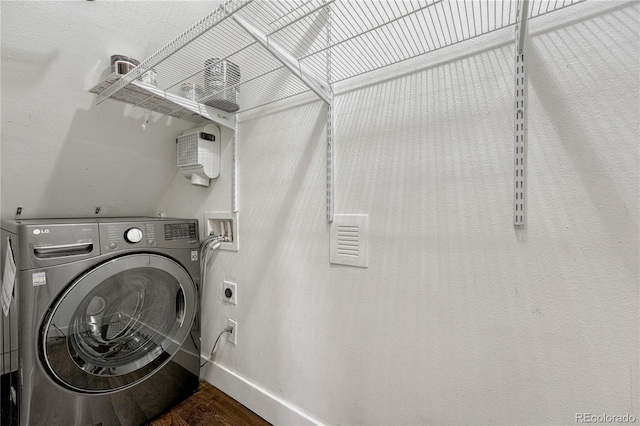 1355 Gaylord St Unit 6, Denver, CO 80206 - clothes washing area featuring washer / dryer, baseboards, and wood finished floors
