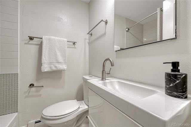 1355 Gaylord St Unit 6, Denver, CO 80206 - bathroom with toilet, vanity, and baseboard heating