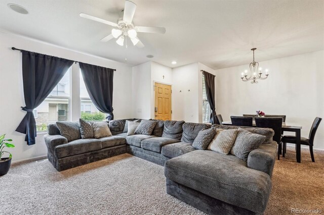 178 Blue Bonnet Dr, Brighton, CO 80601 - living area with carpet flooring, a chandelier, ceiling fan, and recessed lighting