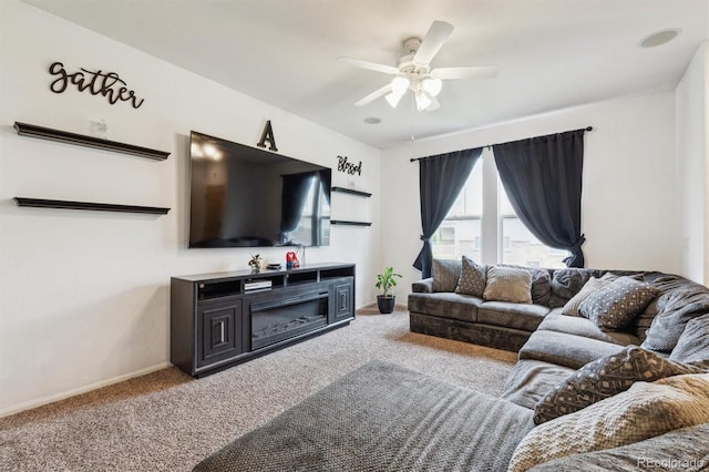 178 Blue Bonnet Dr, Brighton, CO 80601 - living room with carpet floors, a ceiling fan, and baseboards