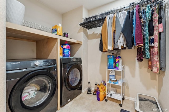 178 Blue Bonnet Dr, Brighton, CO 80601 - washroom with separate washer and dryer, tile patterned floors, and baseboards