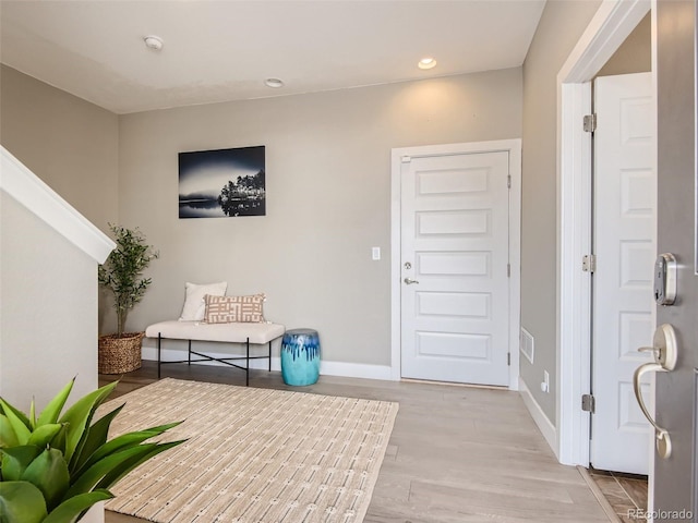 entrance foyer featuring light hardwood / wood-style floors