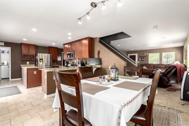 3505 Dinosaur St, Castle Rock, CO 80109 - dining space with light stone finish flooring and recessed lighting