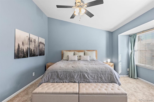 bedroom with ceiling fan and carpet