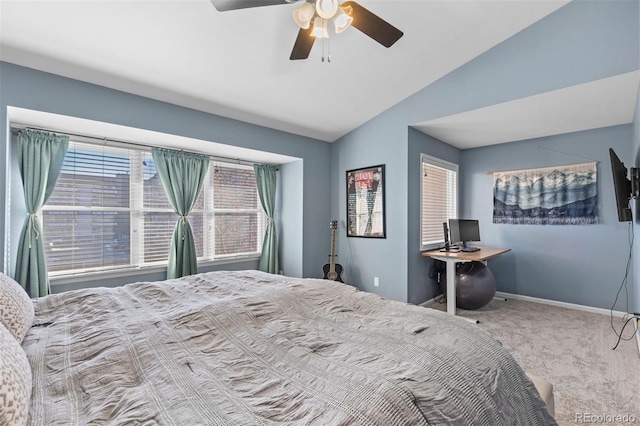 bedroom with ceiling fan, carpet flooring, and vaulted ceiling