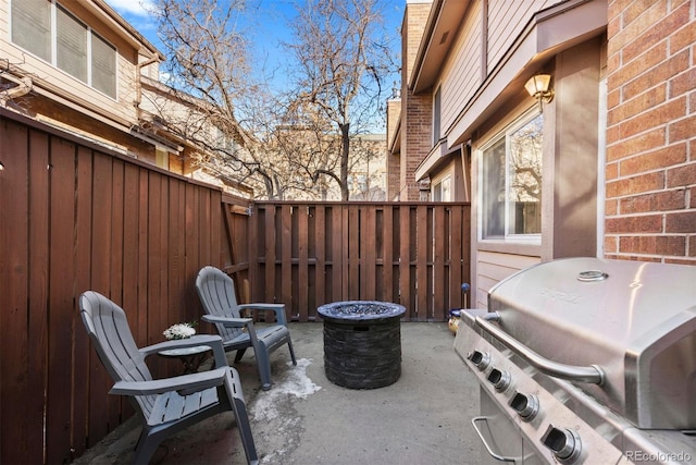 view of patio with a grill