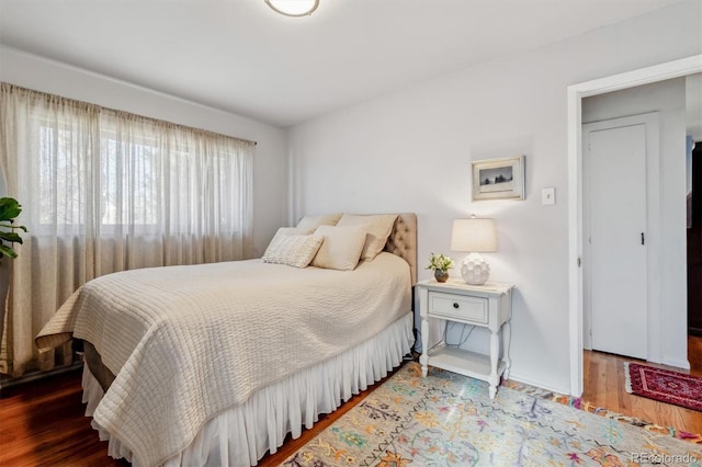 bedroom featuring wood-type flooring