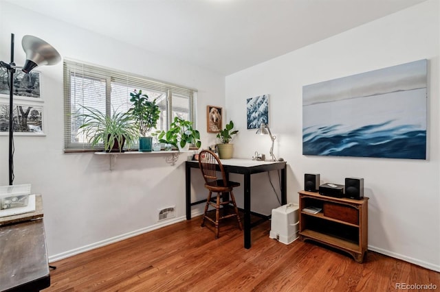 office area featuring hardwood / wood-style floors