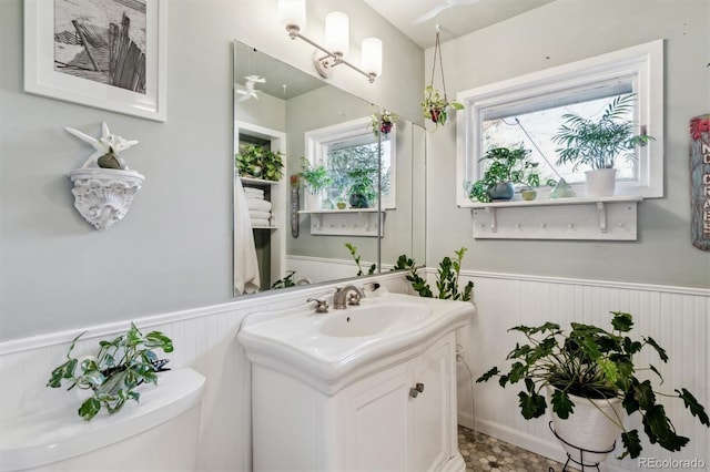 bathroom with vanity and toilet