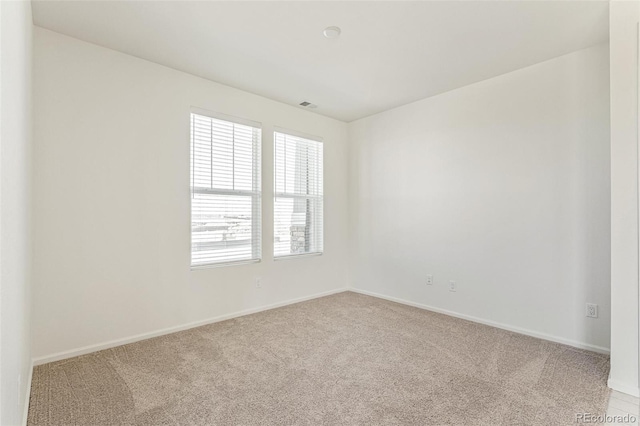13458 E 111th Ave, Commerce City, CO 80022 - spare room featuring carpet and baseboards