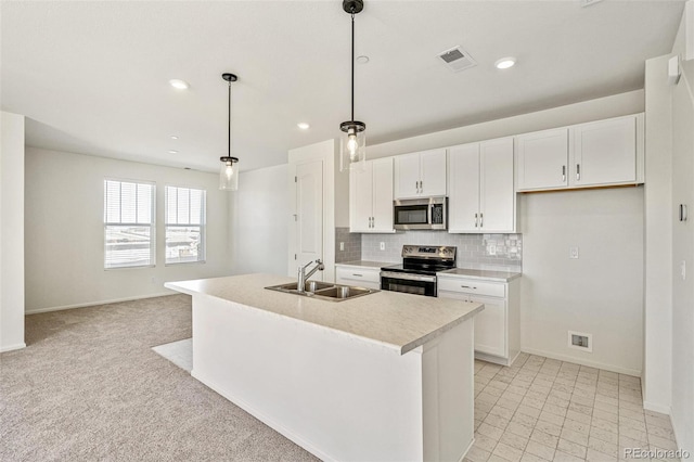 13458 E 111th Ave, Commerce City, CO 80022 - kitchen featuring stainless steel appliances, a sink, white cabinetry, baseboards, and recessed lighting