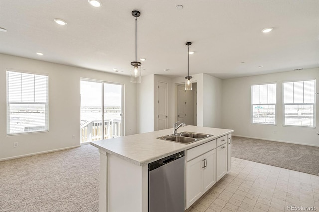 13458 E 111th Ave, Commerce City, CO 80022 - kitchen featuring open floor plan, stainless steel dishwasher, light colored carpet, a sink, and recessed lighting