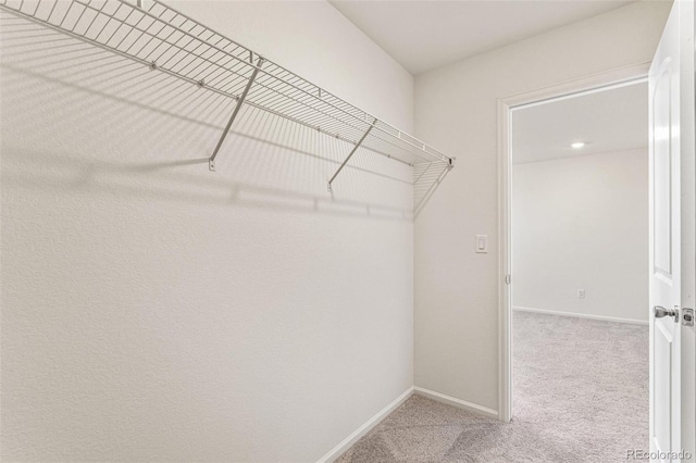 13458 E 111th Ave, Commerce City, CO 80022 - spacious closet featuring carpet floors