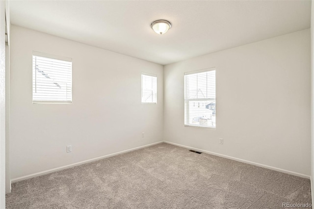 13458 E 111th Ave, Commerce City, CO 80022 - spare room with carpet floors and baseboards