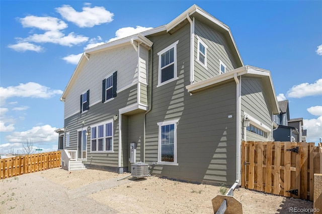 13458 E 111th Ave, Commerce City, CO 80022 - back of property with central AC unit and fence