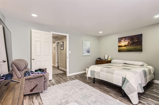7465 S Ivy Way, Centennial, CO 80112 - bedroom with wood finished floors, baseboards, and recessed lighting